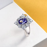 Oval Cut Sapphire Eight Prong Sterling Silver Halo Ring