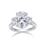 Three Stone Oval Moissanite And Half Moon Triple Pave Engagement Ring