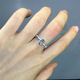 Oval Moissanite With Marquise Accents Engagement Ring