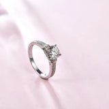 Round Moissanite Four Prong Side Stone Promise Engagement Ring