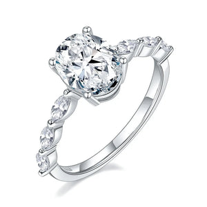 Oval Moissanite With Marquise Accents Engagement Ring