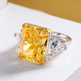 Three Stone Radiant Cut Yellow Sapphire Two Tone Sterling Silver Ring