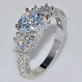 Vintage Three Stone Moissanite Scroll Filigree Engagement Ring