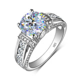 Moissanite With Channel Set Sapphire Accents Engagement Ring