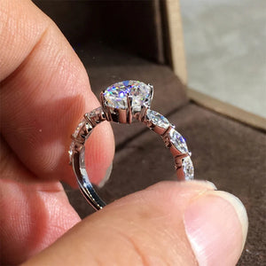 Oval Moissanite With Marquise Accents Engagement Ring