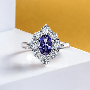 Oval Cut Sapphire Eight Prong Sterling Silver Halo Ring