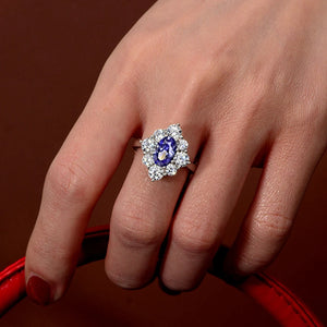 Oval Cut Sapphire Eight Prong Sterling Silver Halo Ring